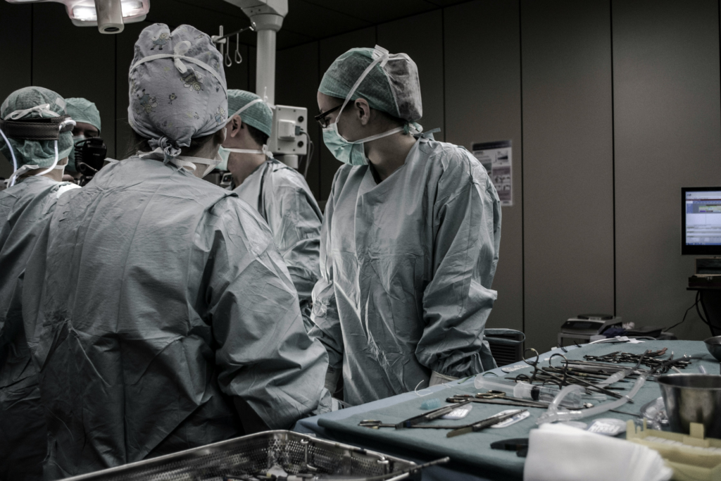 Doctors at work in operating room.